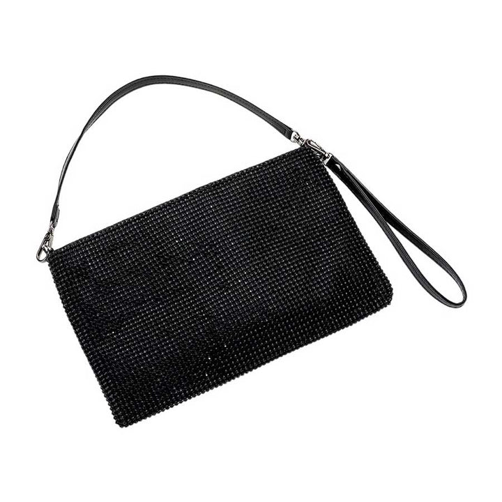 Black Bling Flat Clutch Crossbody Bag, is perfect for the fashionista on the go. Crafted from high-quality materials, the bag features a chic bling design with a flat clutch and adjustable crossbody strap for hands-free ease. Perfect for special occasions, get ready to sparkle and shine!