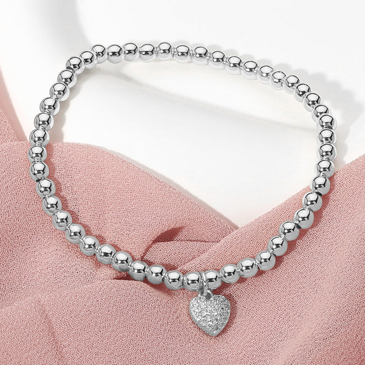 Clear, Silver Stainless Steel Stone Paved Heart Charm Beaded Stretch Bracelet