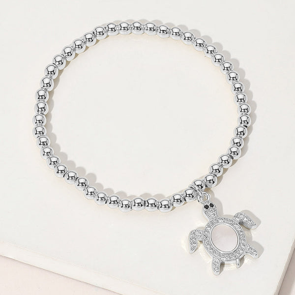 Mother of Pearl, Silver Stainless Steel Ball Mother of Pearl Sea Turtle Charm Beaded Stretch Bracelet
