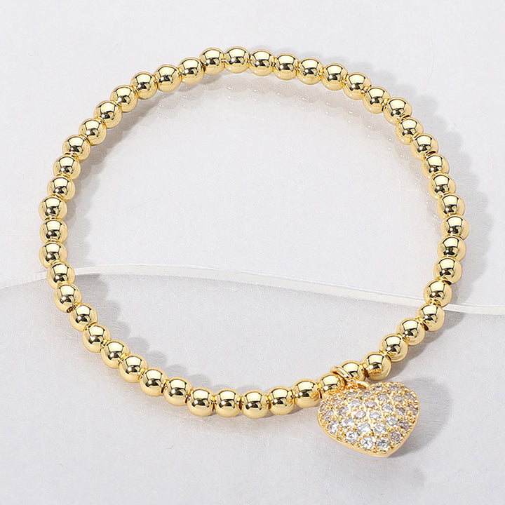Clear, Gold Reversible Stainless Steel Heart Charm Beaded Stretch Bracelet