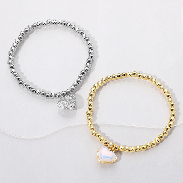 Clear, Silver Reversible Stainless Steel Heart Charm Beaded Stretch Bracelet