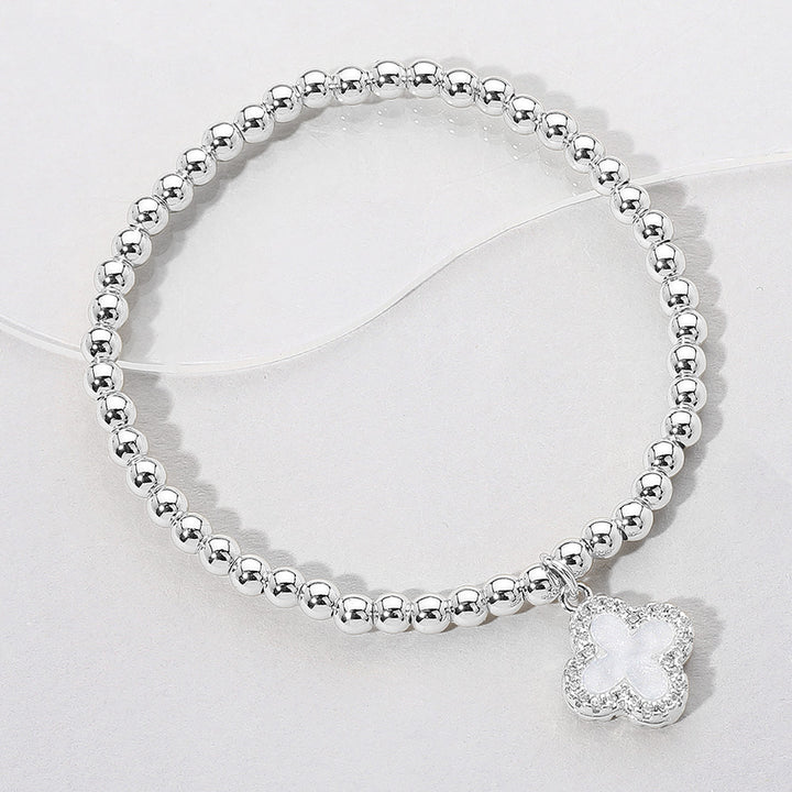 Mother of Pearl, Silver Reversible Stainless Steel Quatrefoil Charm Beaded Stretch Bracelet