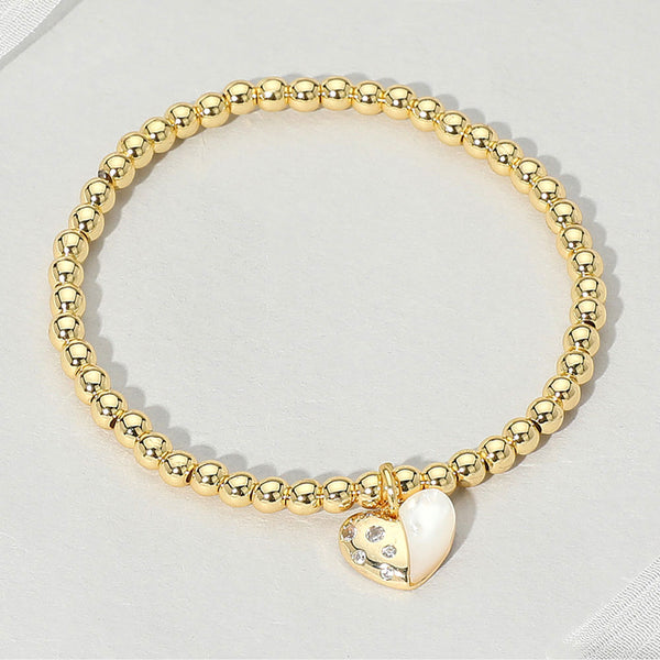 Gold Stainless Steel Mother Of Pearl Heart Charm Beaded Stretch Bracelet