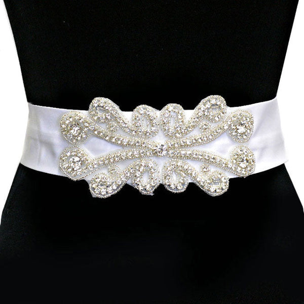 Clear White Bridal Wedding Crystal & Bead Ribbon Belt Headband. A timeless selection, this  Crystal  Belt is exceptionally elegant, adding an exquisite detail to your wedding dress or tie it on your hair for a glamorous, beautiful self tie headband elevating your hairstyle on your super special day. Crystal applique is placed delicately on white organza ribbon, long enough to fit comfortably around your waist.