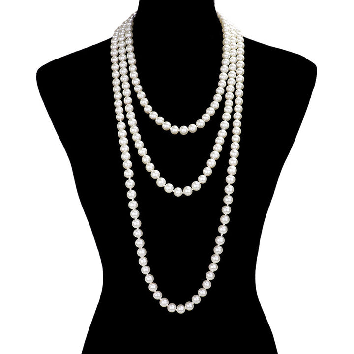 This exquisite long pearl necklace boasts a sophisticated look for any occasion, from special anniversaries to a night out. Enjoy this elegant reminder of your love for years to come, the perfect addition to every outfit. Birthday Gift, Anniversary Gift, Christmas Gift, Regalo de Cumpleanos, Navidad, Aniversario, etc