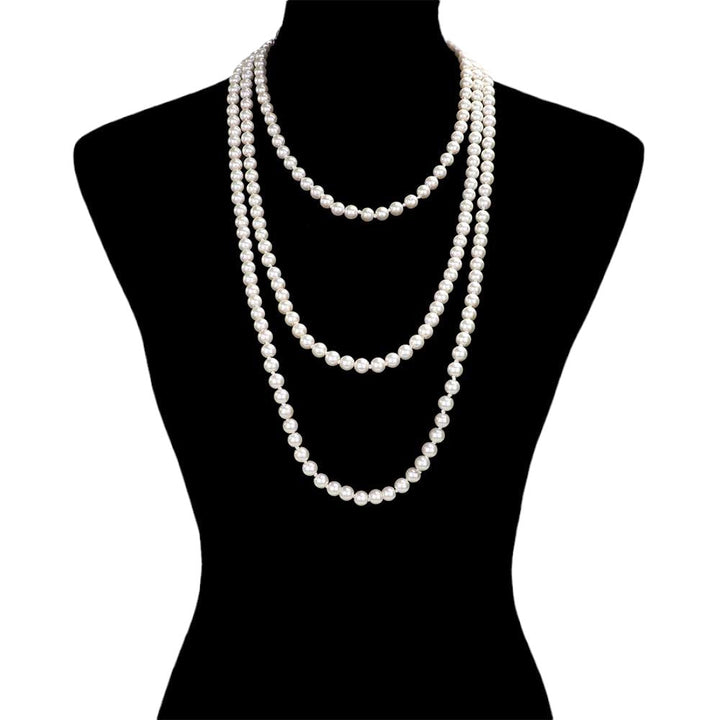 Cream Trendy Pearl Long Necklace, get ready with this pearl long necklace to receive the best compliments on any special occasion. This classy pearl long necklace is perfect for parties, weddings, and evenings. Awesome gift for birthdays, anniversaries, Valentine’s Day, or any special occasion.