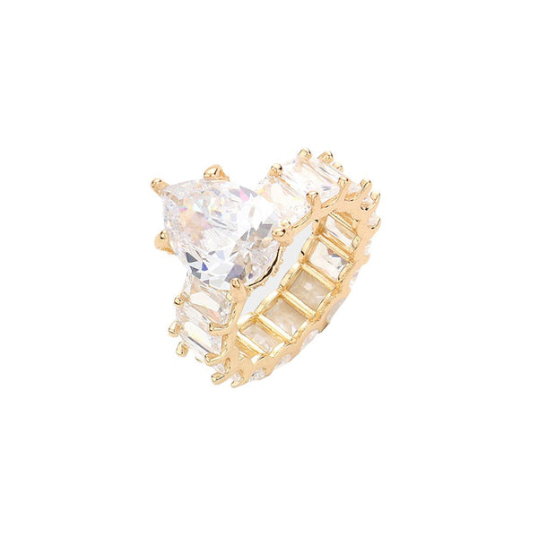 Gold Rectangle Stone Accented Baguette Stone Band Ring is crafted with a stone set border and baguette-cut stones for a unique and chic look. Each stone is hand-selected and placed to ensure quality and shine. Show off your personal style on any occasion with this eye-catching ring!