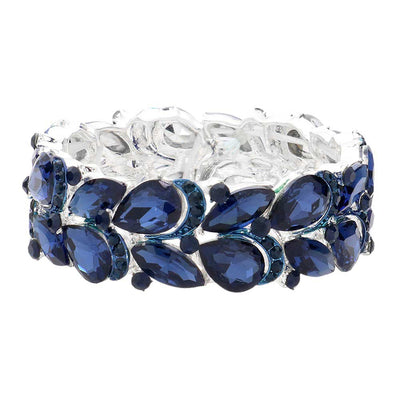 Montana Blue Teardrop Stone Cluster Embellished Stretch Evening Bracelet is an eye-catching accessory. It features teardrop-shaped embellishments and sparkly stones clustered together to create a glamorous and sophisticated finish. The stretch fit makes it comfortable to wear for any special occasion or making an exclusive gift.