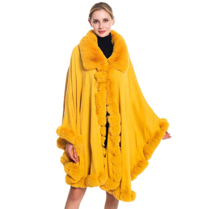 Mustard Fashionable Faux Fur Trim Poncho, is cute, luxurious and the best comfort accessory for this winter. The cute color variation and fashionable look enhance your glamour at any place and any occasion. It is the best companion which keeps you warm and toasty in the cold weather and outings. You can throw it on over so many pieces elevating any casual outfit! Perfect Gift for Wife, Mom, Birthday, Holiday, Christmas, Anniversary, Fun Night Out. Stay awesome and trendy with this beautiful poncho.