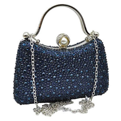 Navy Crystal Diamond Top Handle Embellished Evening Clutch Bag is a remarkable evening bag, crafted from premium materials with a crystal diamond top handle for a special touch. Featuring a soft-textured fabric lining and a stylish, elegant exterior, this clutch bag is ideal for special occasions.