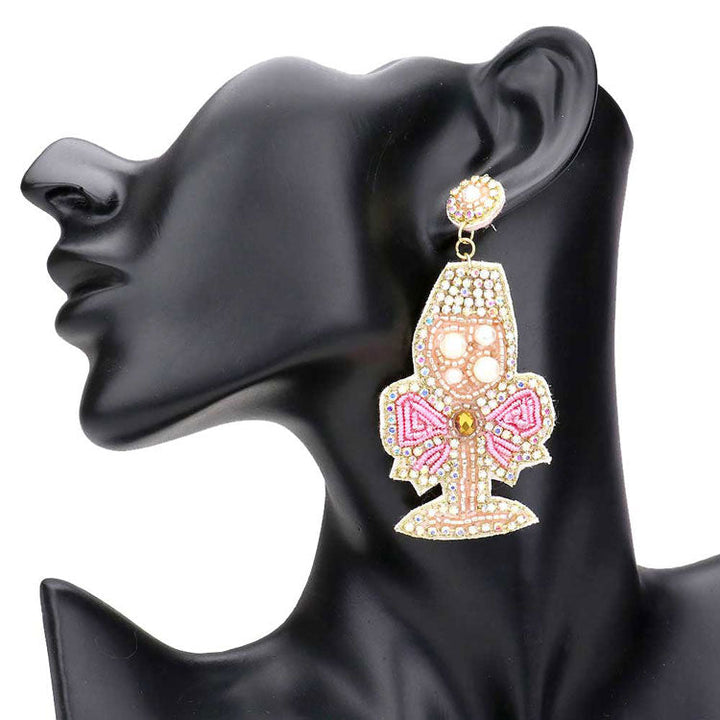 Pink Felt Back Beaded Pearl Embellished Champagne Dangle Earrings. Felt back beaded earrings fun handcrafted jewelry that fits your lifestyle, adding a pop of pretty color. Enhance your attire with these vibrant artisan earrings to show off your fun trendsetting style. Great gift idea for Wife, Mom, or your Loving One.Lightweight and comfortable for wearing all day long. Goes with any of your casual outfits and Adds something extra special.