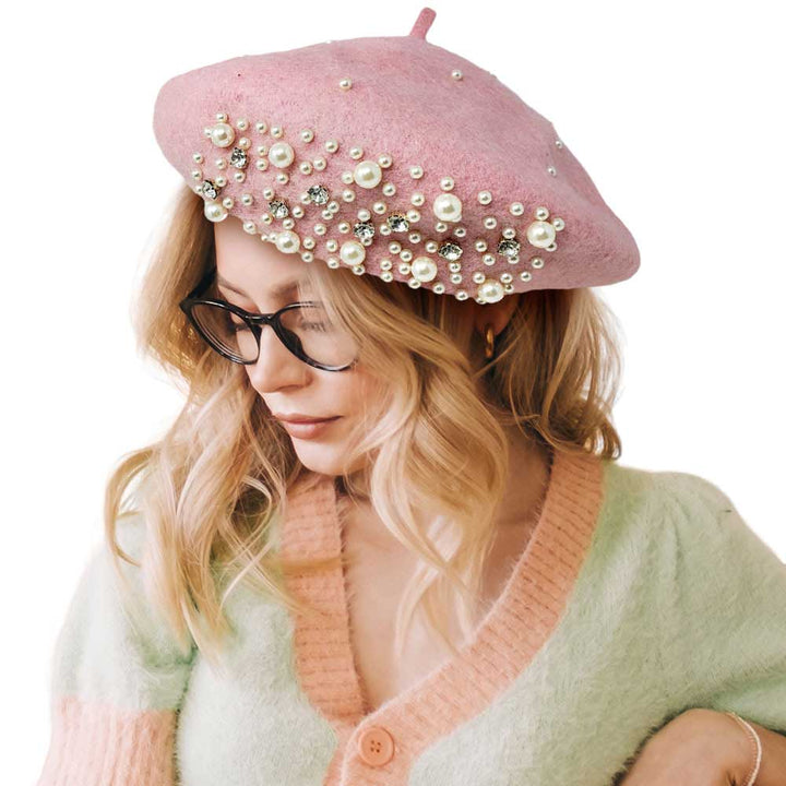 Pink Pearl Stone Embellished Solid Beret Hat, this timeless pearl stone beret hat is a luxurious accessory for any wardrobe. Crafted from a quality fabric, it's adorned with shimmering pearl stones that will add a touch of opulence to any outfit. Perfect gift item for Birthdays, Christmas, Secret Santa, and anniversaries.