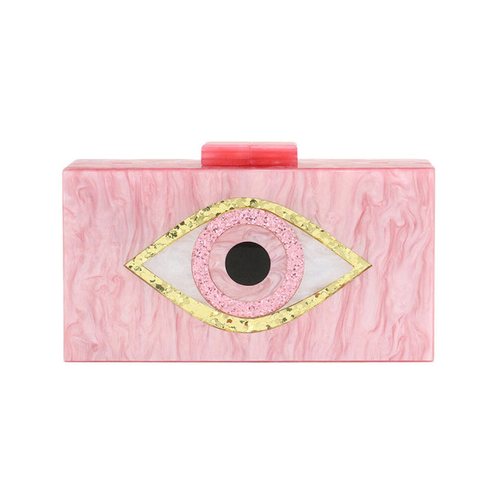 This Pink Glittered Evil Eye Celluloid Acetate Clutch Crossbody Bag will make you the star of the show! This eye-catching bag is studded with glitter, and is made with durable celluloid acetate to last you a lifetime. Perfect gift ideas for a birthday, Christmas, anniversary, Valentine's Day, or any special occasion.
