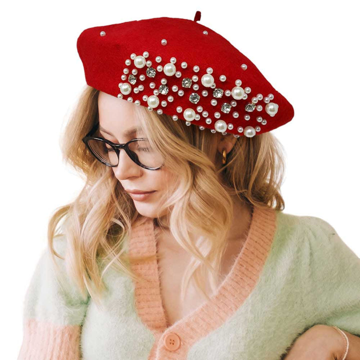 Red Pearl Stone Embellished Solid Beret Hat, this timeless pearl stone beret hat is a luxurious accessory for any wardrobe. Crafted from a quality fabric, it's adorned with shimmering pearl stones that will add a touch of opulence to any outfit. Perfect gift item for Birthdays, Christmas, Secret Santa, and anniversaries.