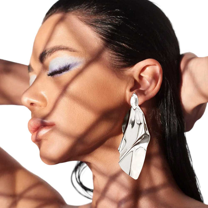 Rhodium Marquise Stone Pointed Crushed Abstract Metal Earrings, get ready with these marquise earrings to receive the best compliments on any special occasion. These classy marquise earrings are perfect for parties, Weddings, and Evenings. Awesome gift for birthdays, anniversaries, Valentine‚Äö√Ñ√¥s Day, or any special occasion.