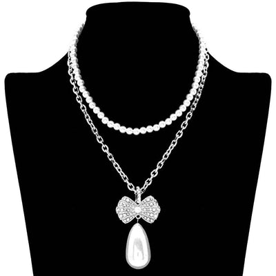 Rhodium Pearl Chain Rhinestone Pave Ribbon Dangle Pendant Necklace, a fashionable and glowing accessory to your outfits. Suitable for most of the outfits that bring compliments. Glowing pearl adds a gorgeous stylish glow to any outfit in style. Jewelry that fits your lifestyle and amps up your confidence! Adds a touch of inspired beauty to your look. Perfect Birthday Gift, Mother's Day Gift, Anniversary Gift, Graduation Gift, Prom Jewelry, Valentine's Day Gift, Thank you, Gift.