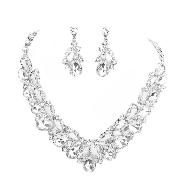 Rhodium Teardrop Accented Stone Embellished Leaf Evening Necklace, this gorgeous jewelry set will show your class on any special occasion. The elegance of these stones goes unmatched, great for wearing at a party! stunning jewelry set will sparkle all night long making you shine like a diamond on special occasions. Perfect jewelry to enhance your look and for wearing at parties, weddings, date nights, or any special event.
