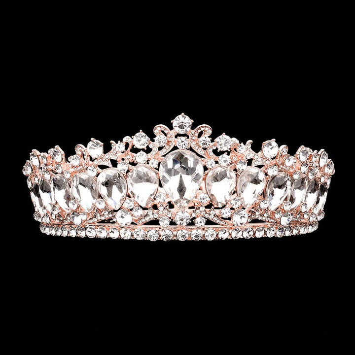 Rose Gold Teardrop Stone Accented Crown Tiara, Add a magical touch to any women on her big day by wearing this sparkling tiara. She will be instantly transformed into a fairytale princess. A stunning teardrop stone tiara that can be a perfect bridal headpiece. Makes you more eye-catching in the crowd. This hair accessory is really beautiful, pretty, and lightweight. Show your royalty with this teardrop princess tiara.