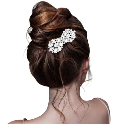 Silver Teardrop Stone Cluster Bow Hair Comb, completes any look. Its bow design is intricately crafted with a cluster of teardrop stones for sparkle and shine. Its lightweight design ensures a comfortable fit for all-day styling. Perfect for gifts or Weddings, Birthdays, Anniversaries, or any other special occasion.