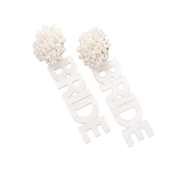 White Pearl Beaded Cluster Resin BRIDE Message Dangle Earrings, these earrings will add a touch of sparkle and sophistication to any bridal outfit. The pearl beads and resin materials create a beautiful cluster design, while the "BRIDE" message adds a special touch. Perfect for any bride looking to make a statement.