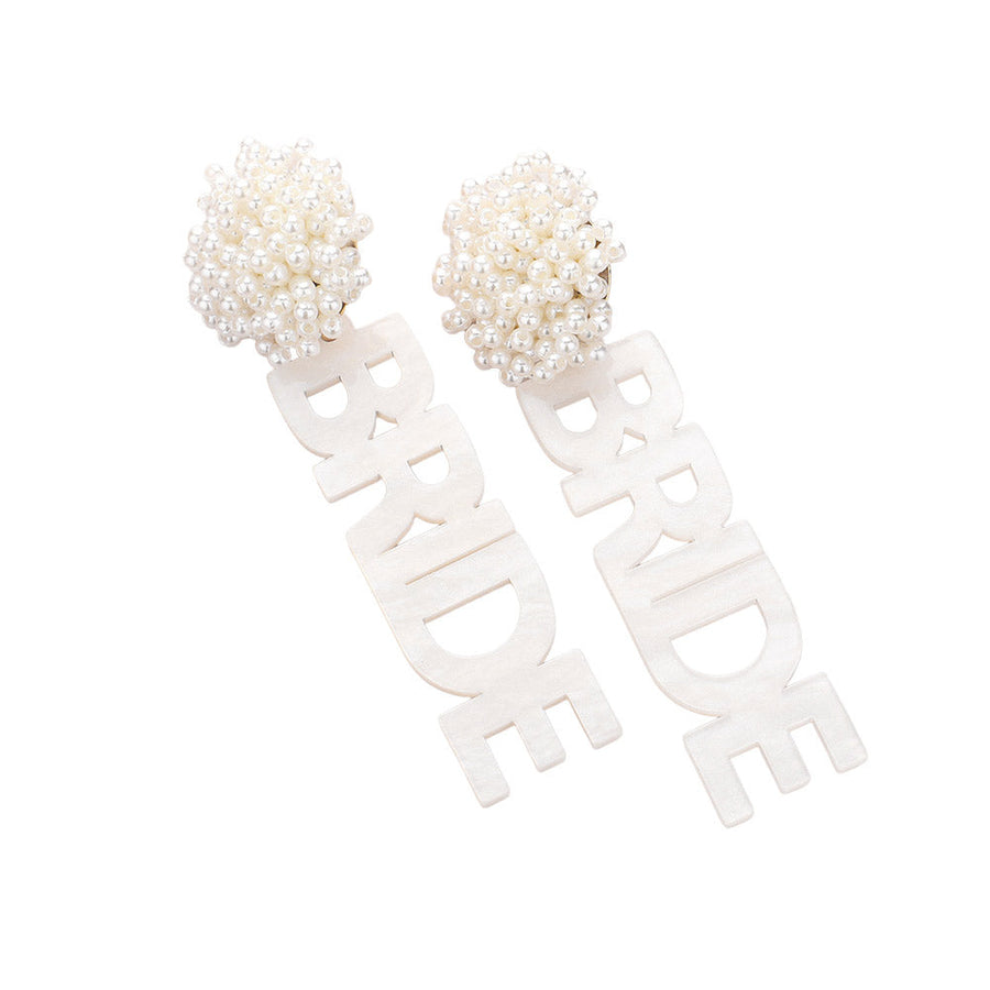 White Pearl Beaded Cluster Resin BRIDE Message Dangle Earrings, these earrings will add a touch of sparkle and sophistication to any bridal outfit. The pearl beads and resin materials create a beautiful cluster design, while the "BRIDE" message adds a special touch. Perfect for any bride looking to make a statement.