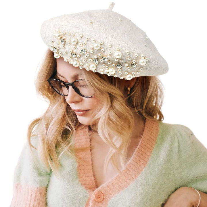 White Pearl Stone Embellished Solid Beret Hat, this timeless pearl stone beret hat is a luxurious accessory for any wardrobe. Crafted from a quality fabric, it's adorned with shimmering pearl stones that will add a touch of opulence to any outfit. Perfect gift item for Birthdays, Christmas, Secret Santa, and anniversaries.