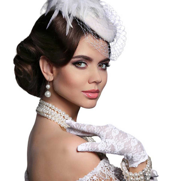 White-Stone Embellished Floral Lace Dressy Wedding Gloves, Crafted with intricate floral lace and adorned with sparkling stones, these gloves add a touch of elegance to any outfit. Made with high-quality materials, they provide a comfortable fit and enhance your overall bridal ensemble.
