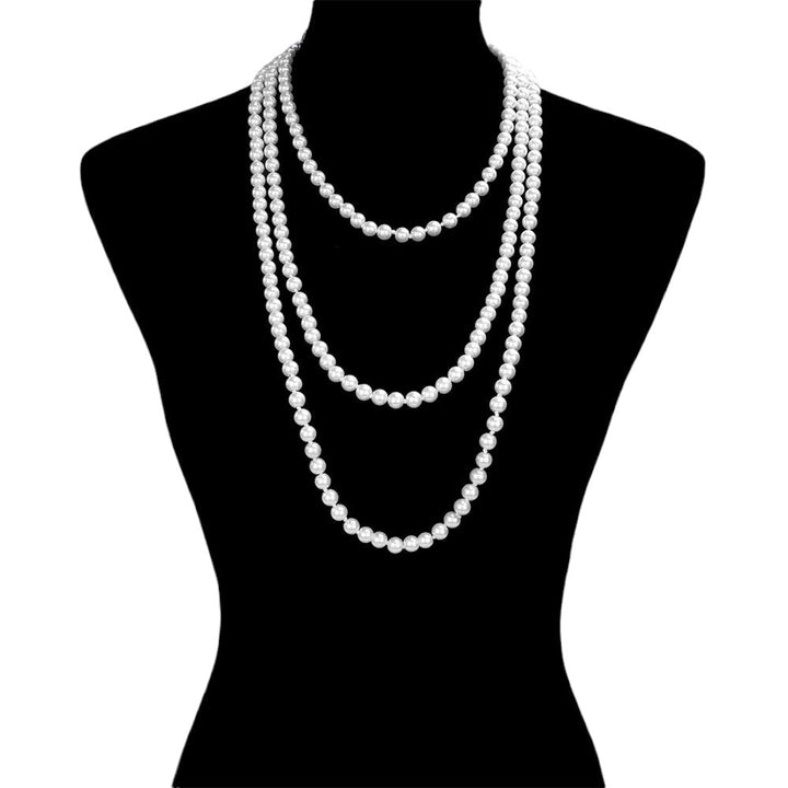 White Trendy Pearl Long Necklace, get ready with this pearl long necklace to receive the best compliments on any special occasion. This classy pearl long necklace is perfect for parties, weddings, and evenings. Awesome gift for birthdays, anniversaries, Valentine’s Day, or any special occasion.
