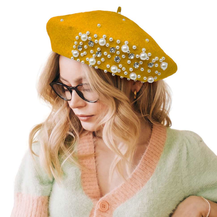 Yellow Pearl Stone Embellished Solid Beret Hat, this timeless pearl stone beret hat is a luxurious accessory for any wardrobe. Crafted from a quality fabric, it's adorned with shimmering pearl stones that will add a touch of opulence to any outfit. Perfect gift item for Birthdays, Christmas, Secret Santa, and anniversaries.